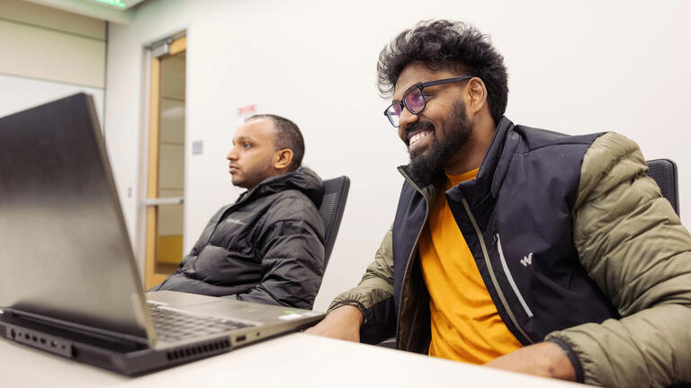 USF student smiling in class