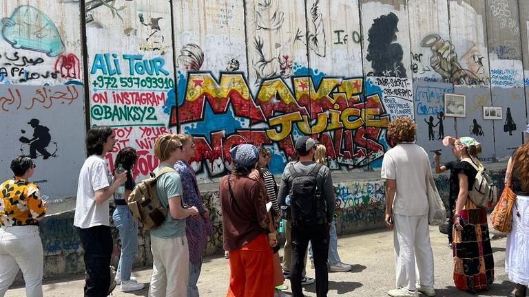 USF group at the wall between Israel and Palestine