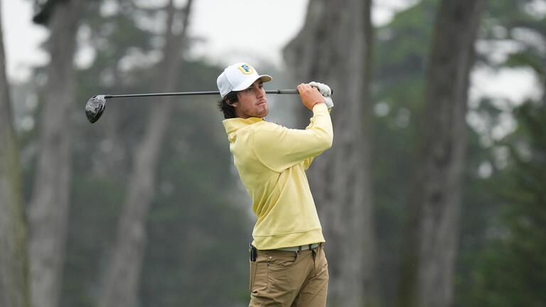 usf student golfer swinging golf club