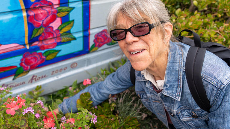 person wearing sunglasses gardening