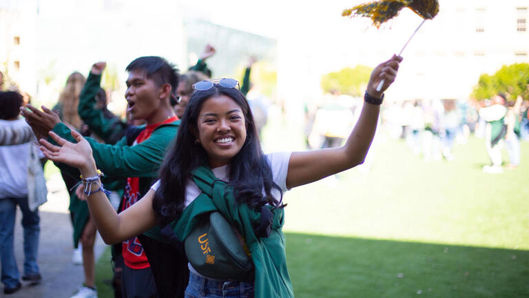 A student celebrating