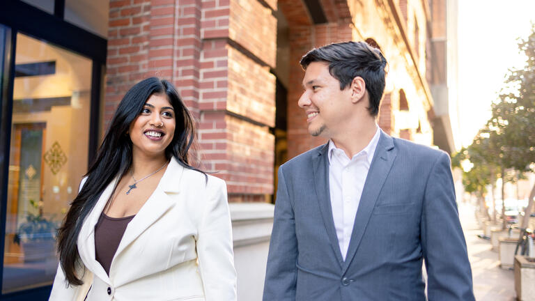 two students walking together in downtown sf