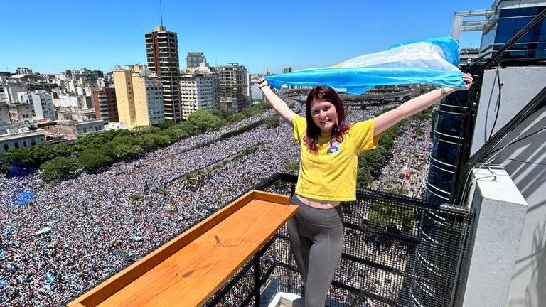 a student watched a crowded street while studying abroad