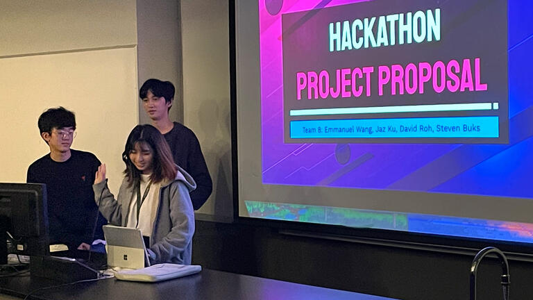 Students present project at hackathon