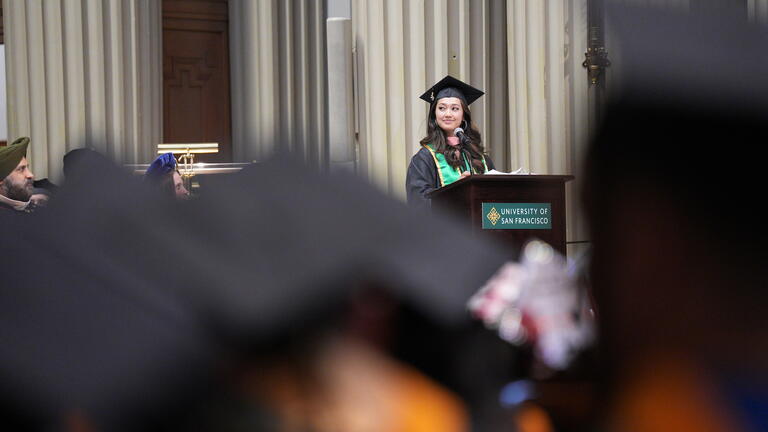 Monique de Villa speaks at commencement