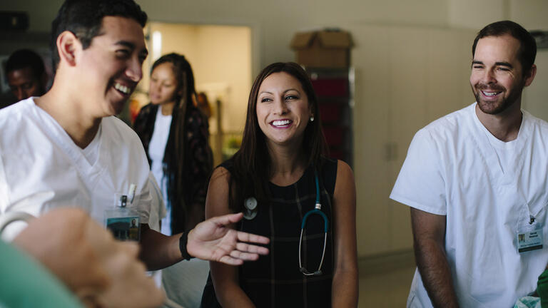 Nursing students smiling.
