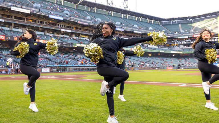 USF’s spirit squad performs on the field