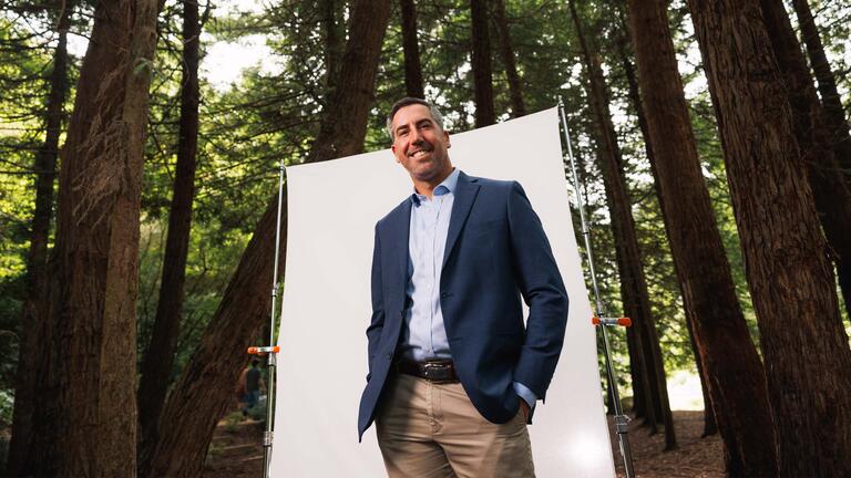 Man posing in the woods