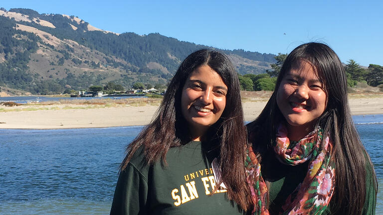 usf students smile in front of Pine Gulch Creek