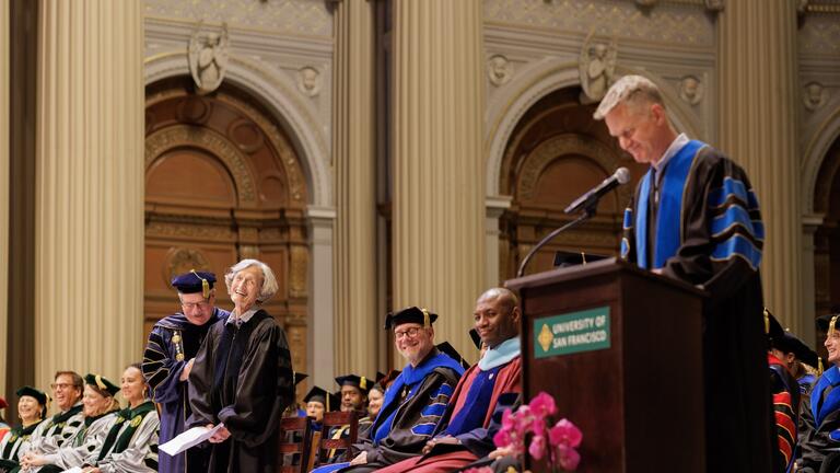Read the story: Ann Zwicker Kerr Joined by Her Son, Coach Steve Kerr, at USF Commencement