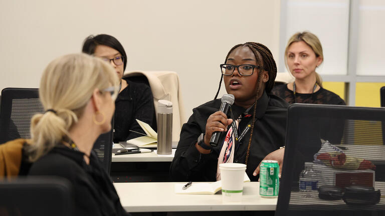 event attendee speaks during retreat