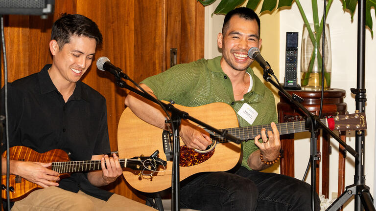 people playing guitar