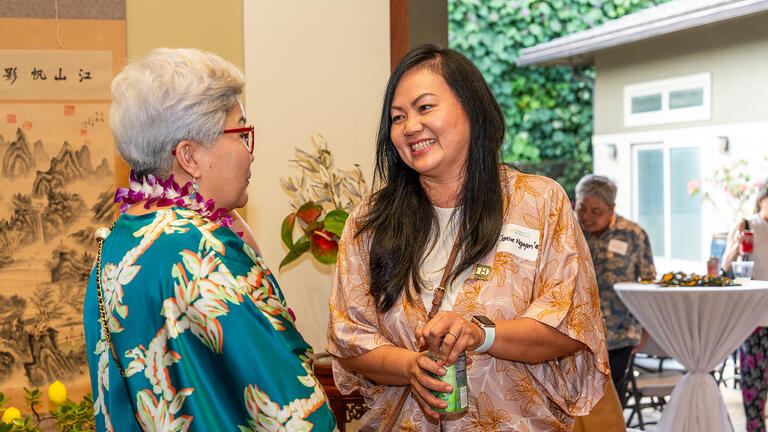Dean Otgo greets Janice Nguyen