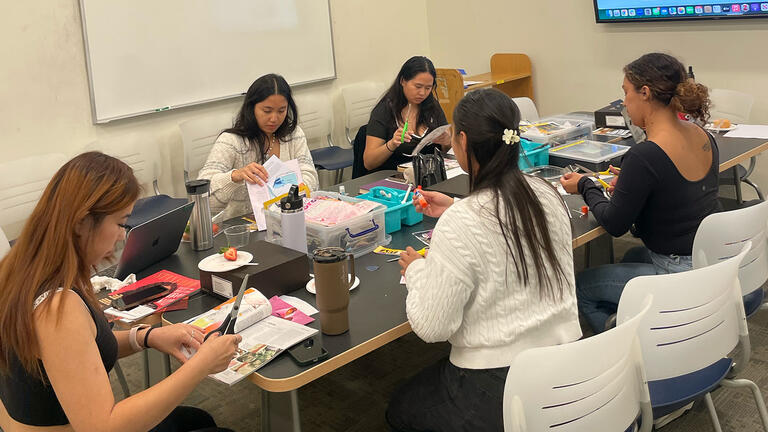 Mellon Scholars work together during a library workshop at the University of San Francisco.