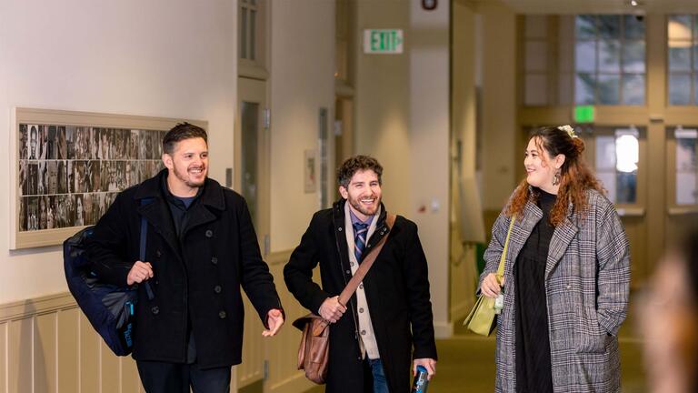 grad students walking and talking