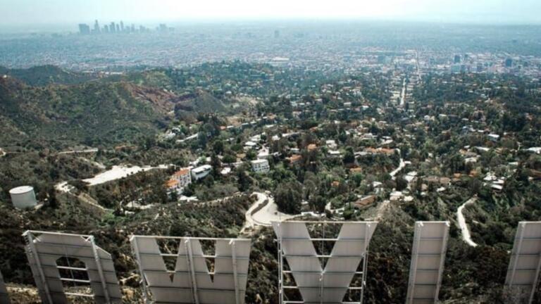 View of LA from behind Hollywood sign