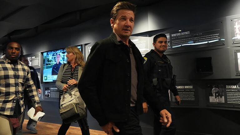 Jeremy Renner backstage walking to the Silk Speaker Series stage