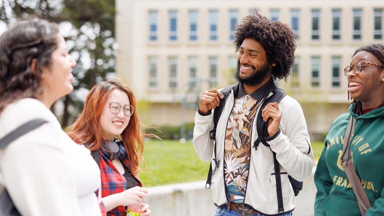 Students talking to each other outside