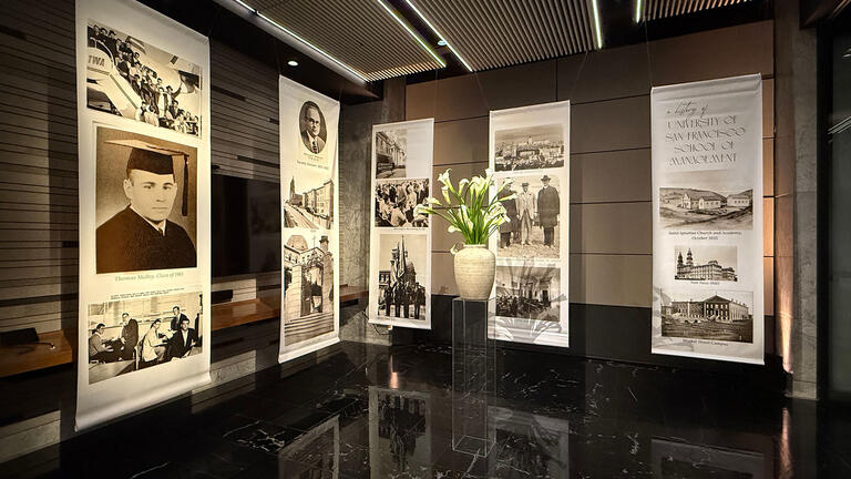 5 banners showcasing the history of SOM
