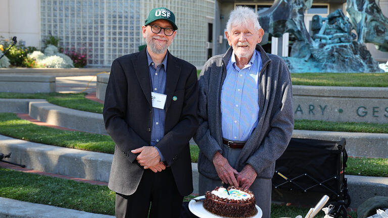 Jeffrey Paris and Robert Seiwald standing together during the centennial bbq