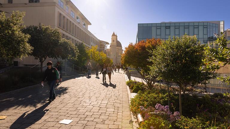 People walking on campus.