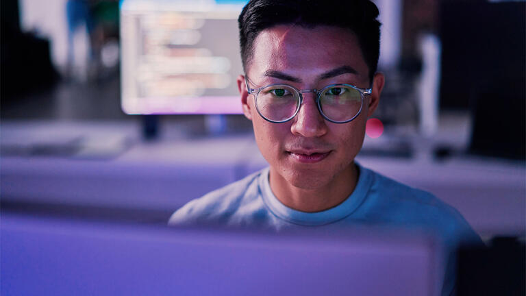 Student working on computer.