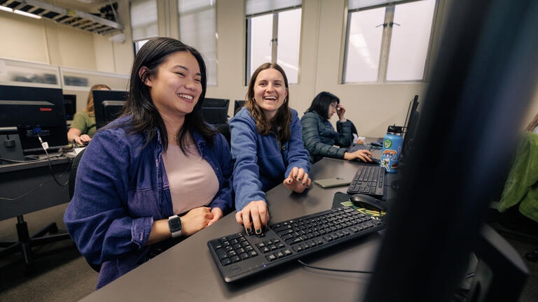 Student working on computer.