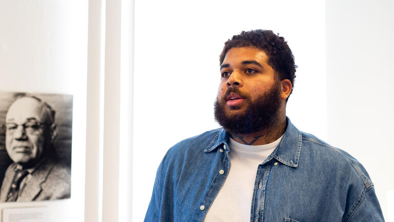student stops to look around during Fillmore walk in San Francisco