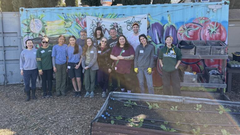 Group of people at a volunteer gardening event
