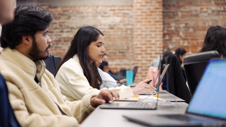 students sit in classroom in downtown campus