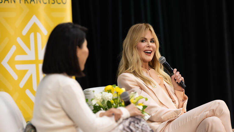 Nicole Kidman on stage with Vicky Nguyen at the Silk Speakers Series with Nicole facing the camera