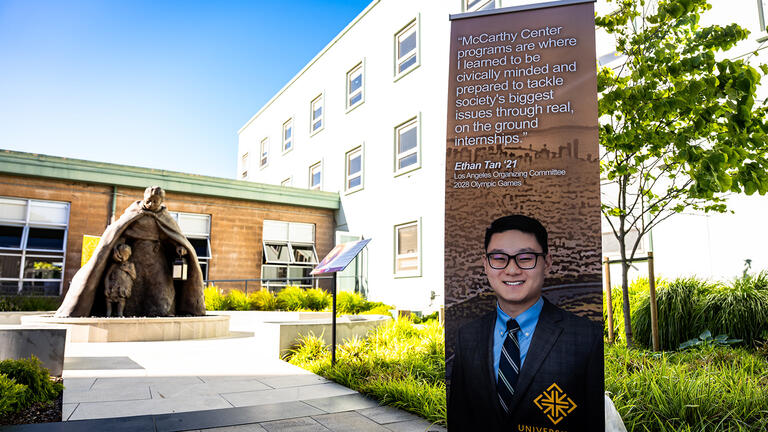 banner of mccarthy center student on usf campus