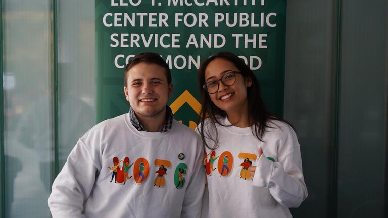 students in front of a leo t mccarthy sign