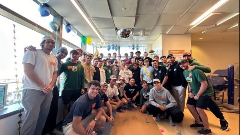 Baseball team visits Jackson Nystrom in hospital