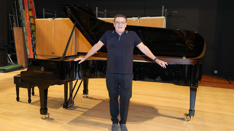 Michael Stein in front of the Steinway grand piano