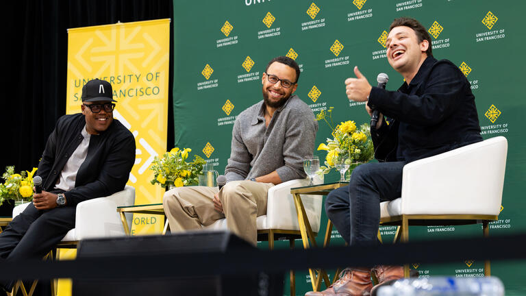 Stephen Curry on stage at the Silk Speakers Series joined by filmmaker Ben Proudfoot, CEO and founder of Breakwater Studios, and Erick Peyton, CEO of Unanimous Media, 