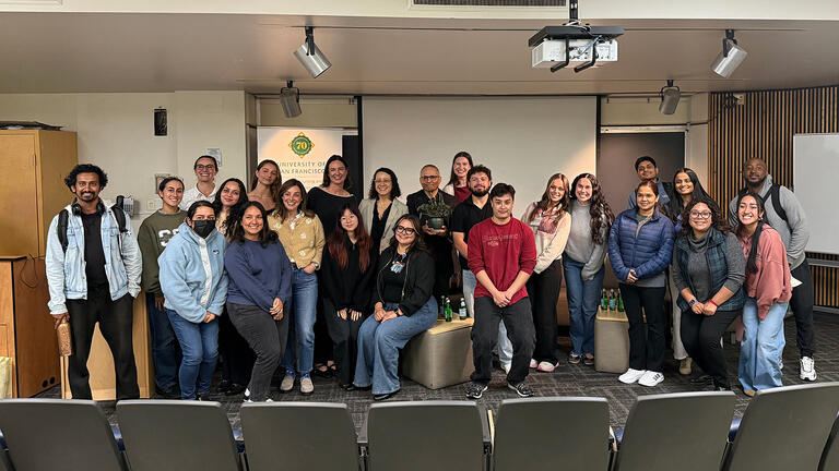 Dr. Tomás J. Aragón stands with event attendees