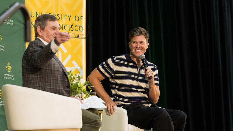 Colin Jost and Jeff Silk ’80 on stage during the Silk Speaker Series