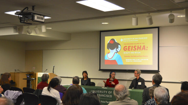 Liza Dalby, Nami Onodera and Professor John Nelson presenting