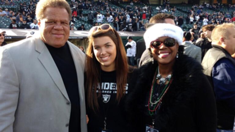 Kalie Pagel ‘13 with Reggie McKenzie, General Manager of the Oakland Raiders, and his wife, June