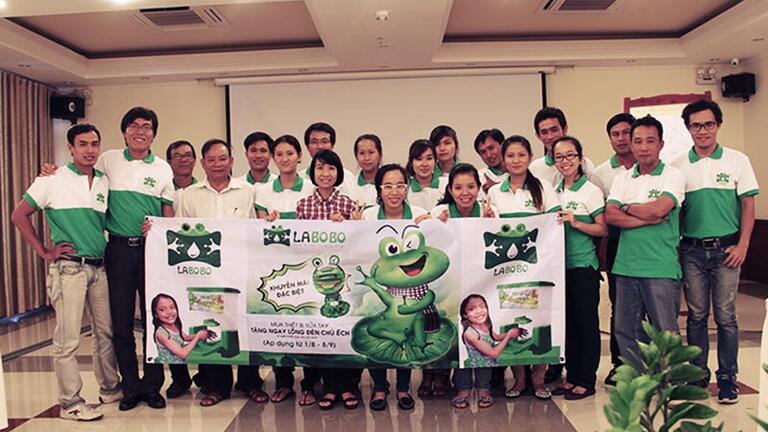 Huynh (third from the right, front row) said she believes a company is a second home.