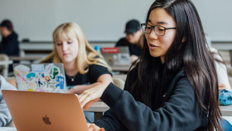 Student with a computer