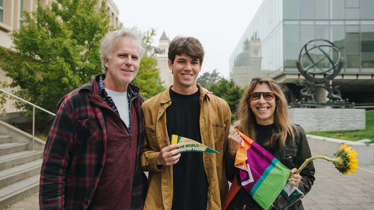 Lucas Carmody with his parents