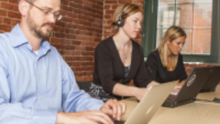 Students Studying at Laptops