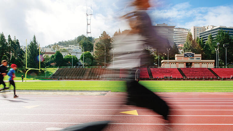 Blurred track runner