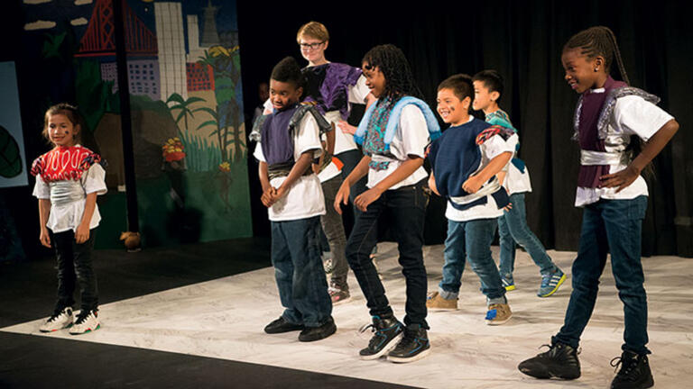 Children acting on stage