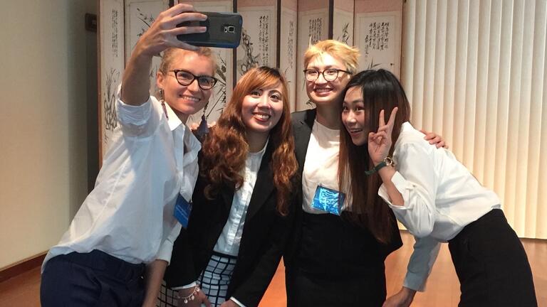 Students posing for selfie at 28th annual School of Pacific and Asian Studies Graduate Conference, at University of Hawai'i at Mānoa