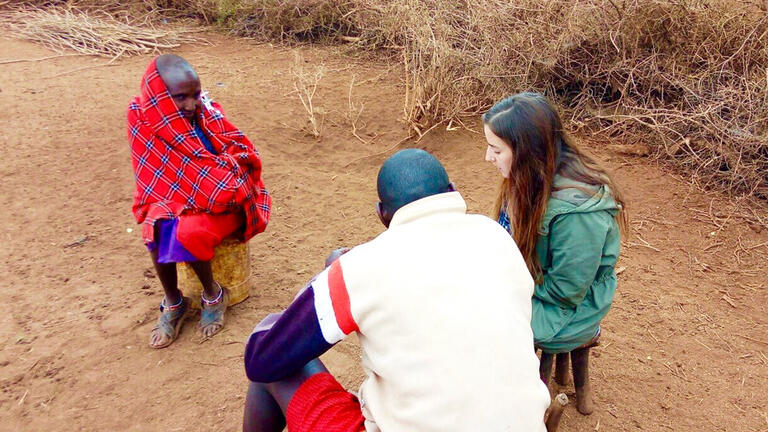 Megan Clemens MA '17 conducts research interview