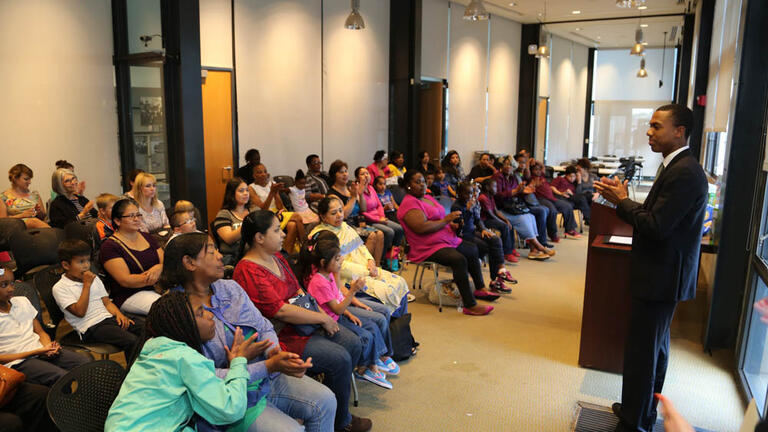 Landon Dickey, Special Assistant to the Superintendent for African American Achievement & Leadership, honors Everybody Reads! participants with certificates of honor from SFUSD Superintendent Richard Carranza (Photo Credit: Don Bowden | ALVS Photography)