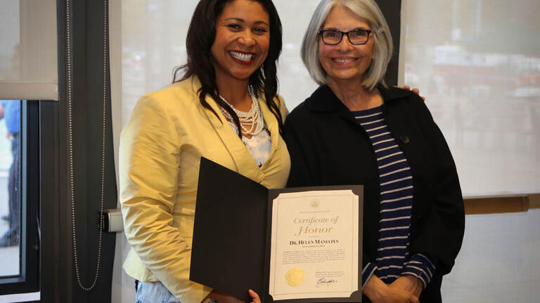 SF Board of Supervisors President London Breed honors Dr. Maniates with a Certificate of Honor from The City & County of San Francisco (Photo Credit: Don Bowden | ALVS Photography)